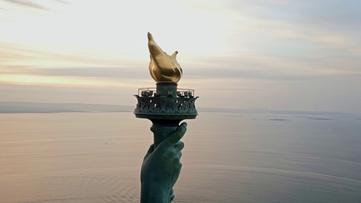 climb the statue of liberty torch